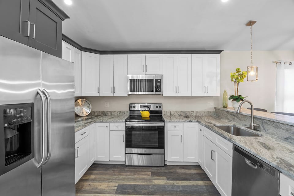 Enjoy cooking in this updated kitchen featuring stainless steel appliances.