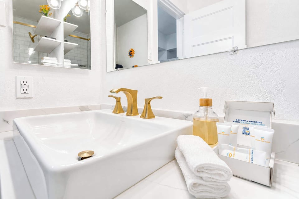 Guest bathroom w/ single vanity & walk-in shower