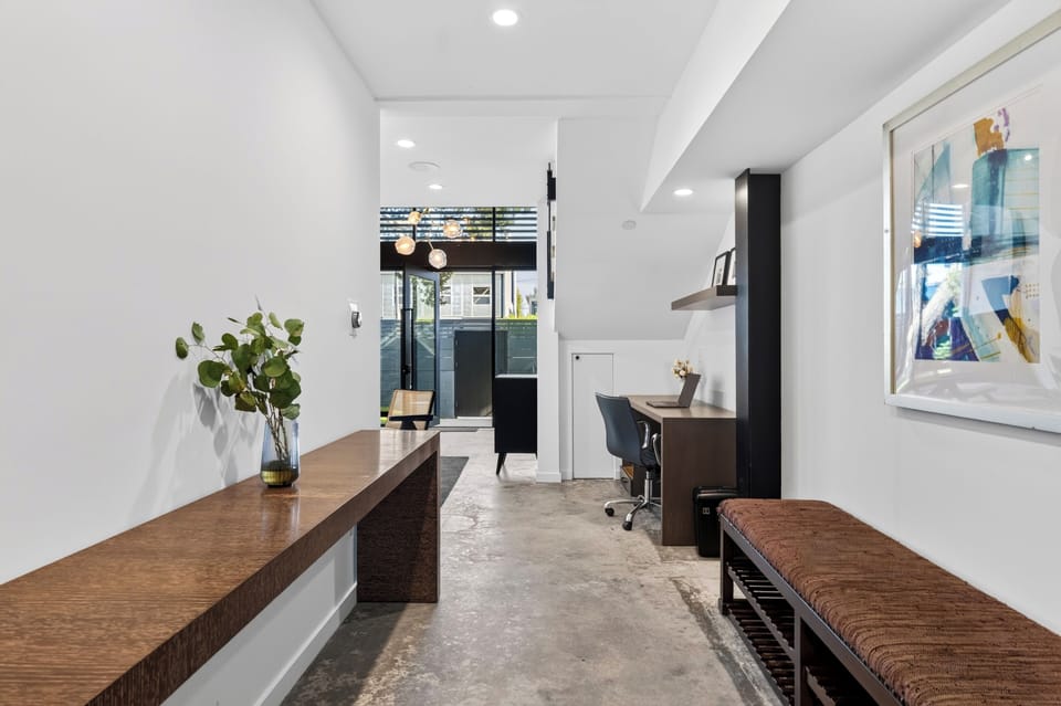 Welcoming entry hall that opens into the home's central living space.