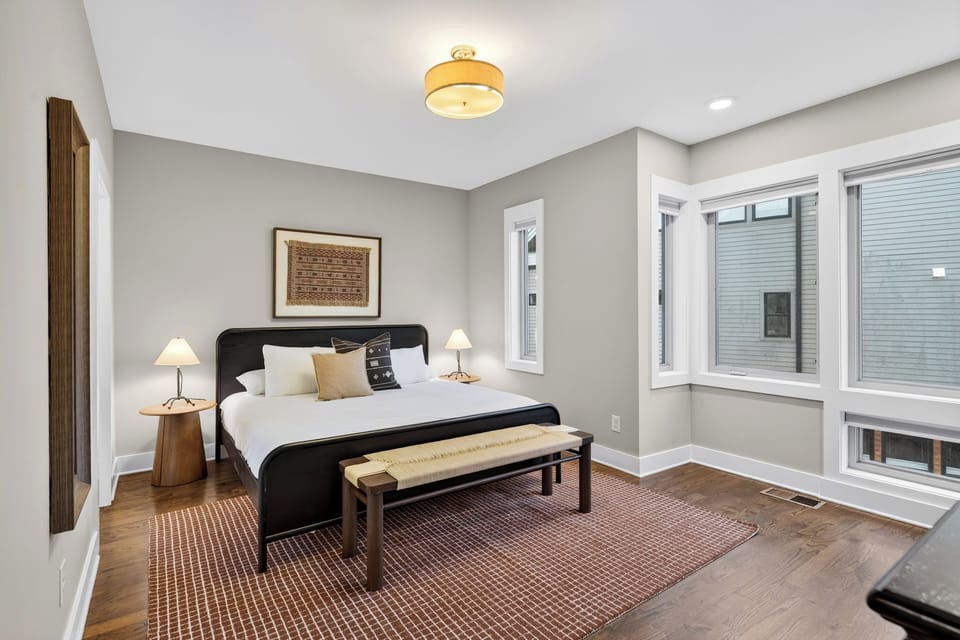 The primary bedroom features a king bed and an ensuite bathroom.