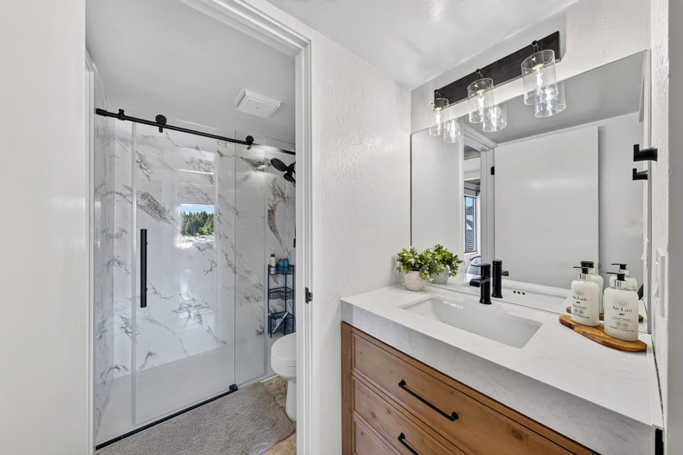 Jack-and-Jill bathroom features a shower.