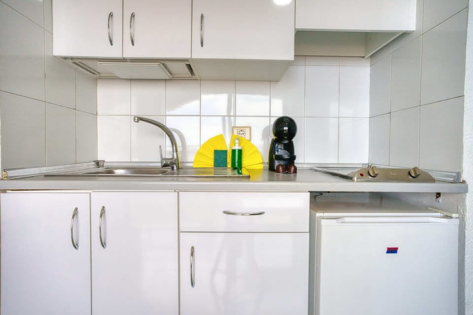 Standard Apartment, Balcony, Partial Sea View | Private kitchen | Fridge, microwave, stovetop, cookware/dishes/utensils