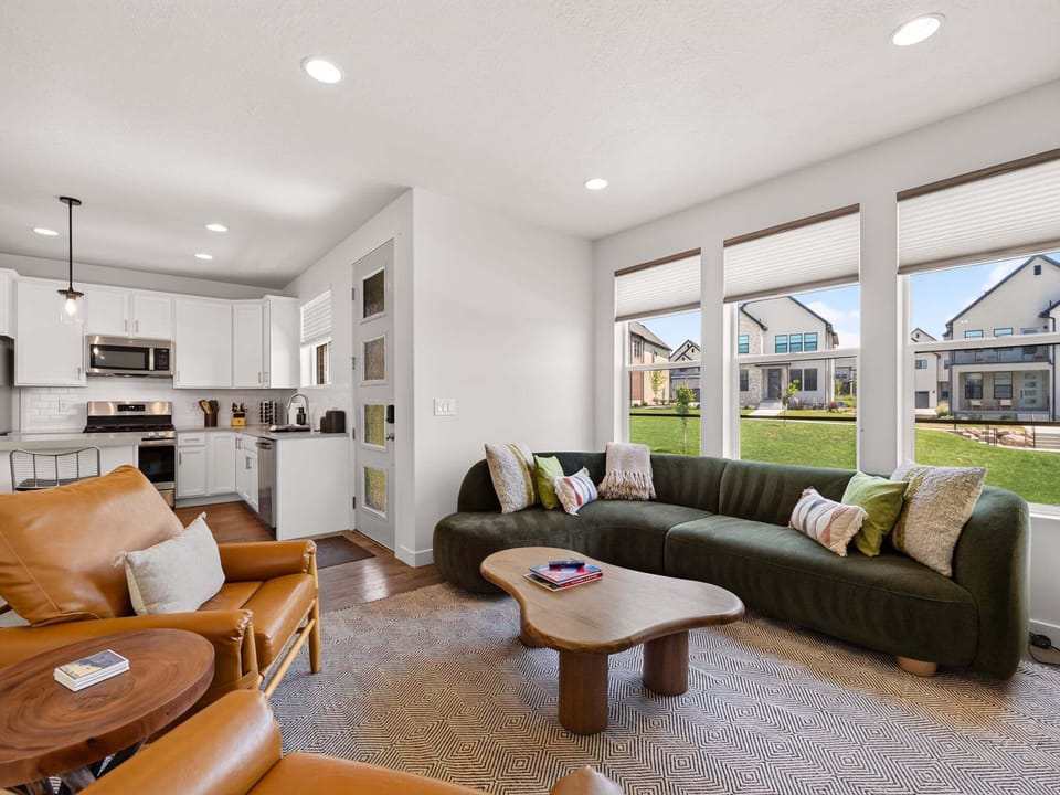 Well appointed and plush with plenty of seating and a 65" Smart TV