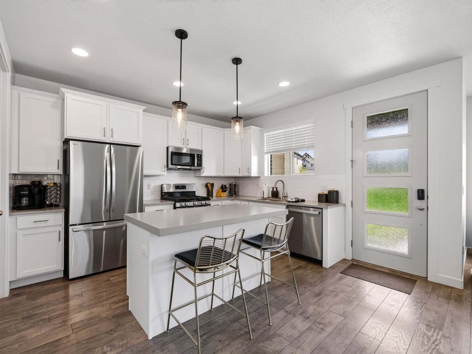 New Stainless Steele appliances, lots of counterspace and an island with additional seating