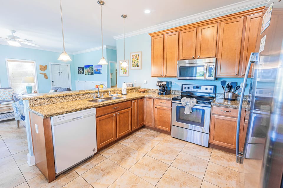 From morning coffee to family dinners, this fully stocked kitchen offers the perfect space to cook, gather, and enjoy quality time together.