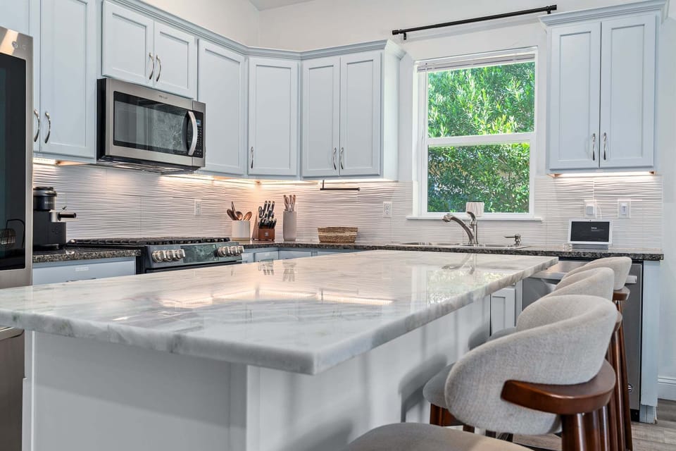 The upgraded kitchen features sleek stainless steel appliances that elevate both style and function.