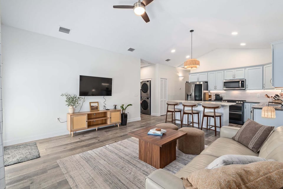 The open design makes the home feel spacious and inviting. It's a perfect spot for unwinding after a day at the beach.