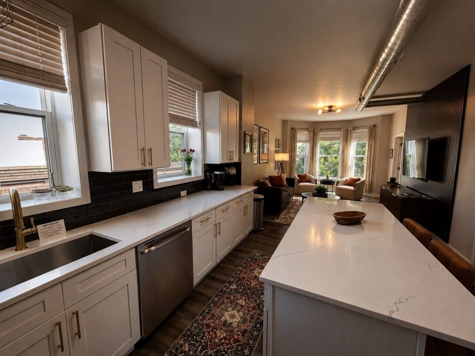 Open-concept living and kitchen space designed to feel stylish, comfortable, and easy to settle into.