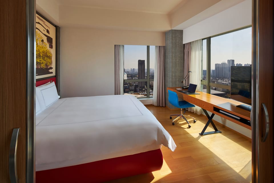 Premium bedding, down comforters, minibar, in-room safe