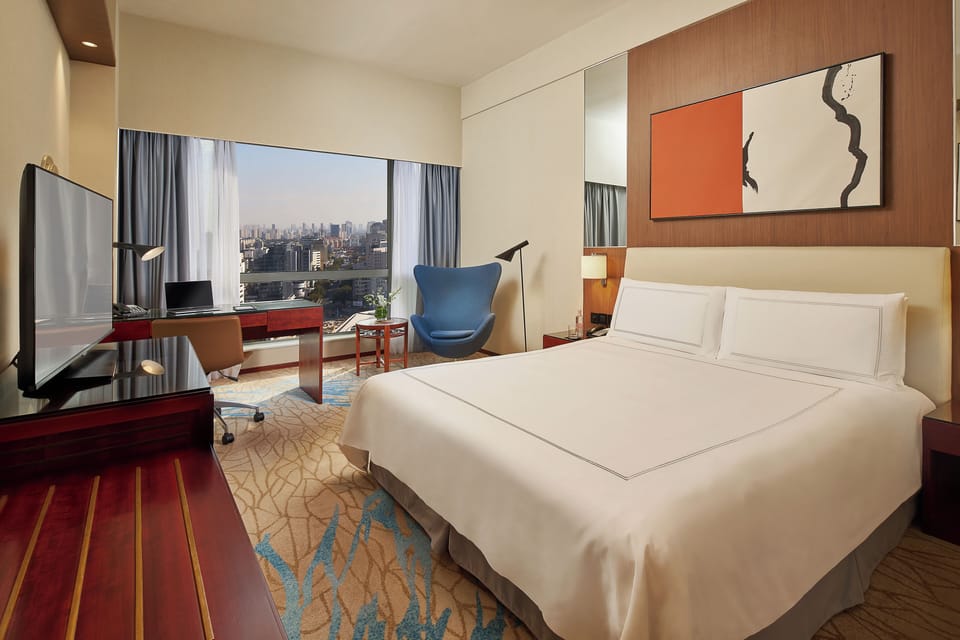 Premium bedding, down comforters, minibar, in-room safe