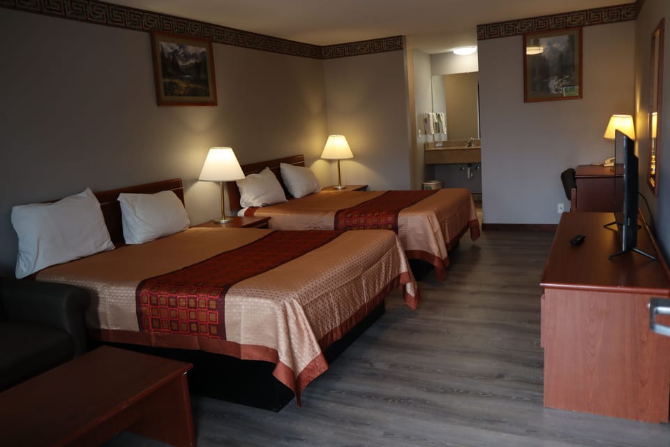 Standard Room, 2 Queen Beds | Desk, iron/ironing board, free WiFi, bed sheets