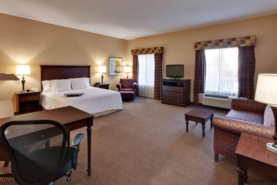 Studio, 1 King Bed, Accessible, Non Smoking | Living area | 25-inch flat-screen TV with cable channels, TV, video-game console