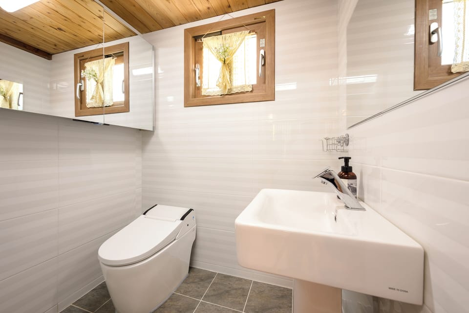 Duplex, Garden View | Bathroom | Hair dryer, towels, soap, shampoo