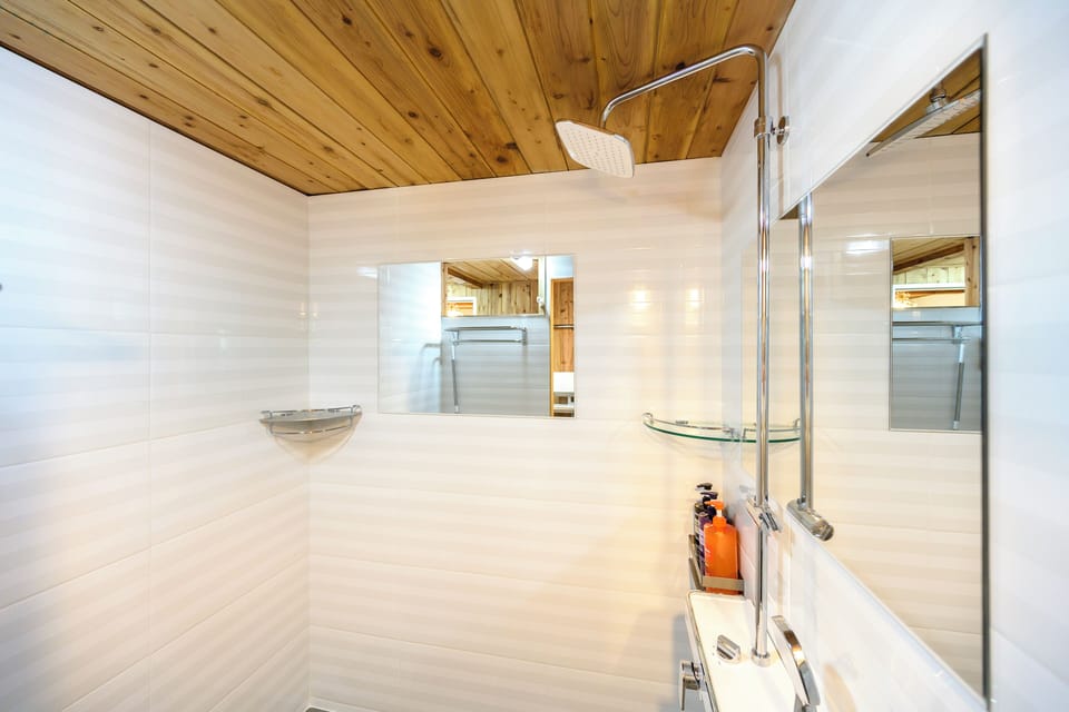 Duplex, Garden View | Bathroom | Hair dryer, towels, soap, shampoo