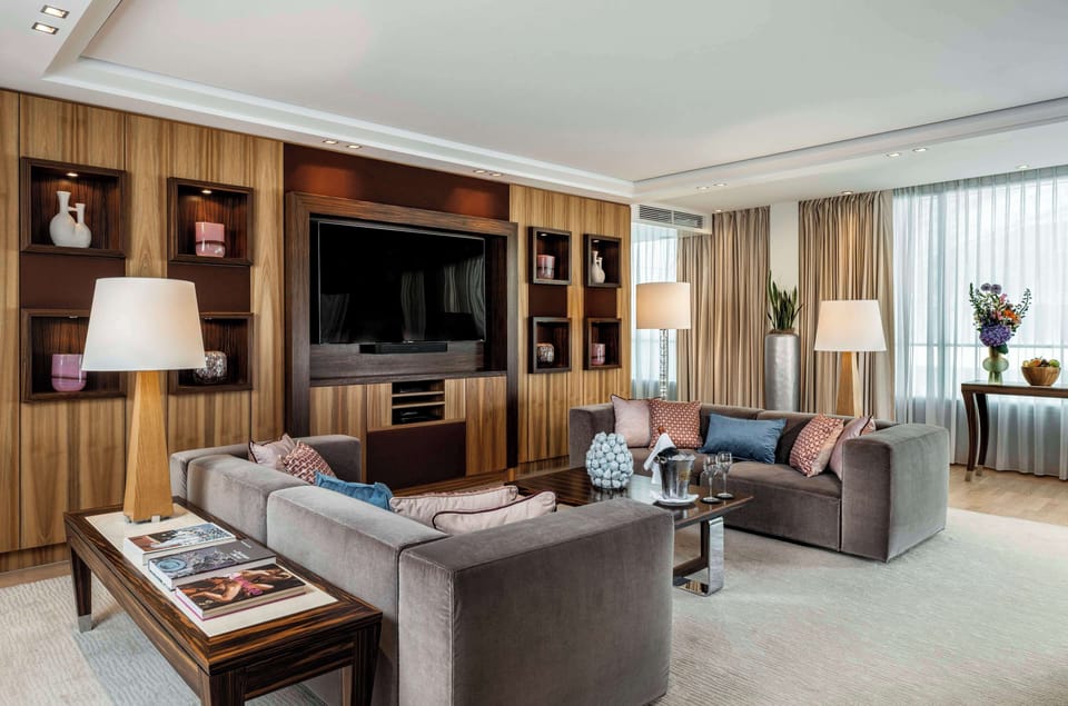 Signature Suite, Patio, City View | Hypo-allergenic bedding, down comforters, minibar, in-room safe