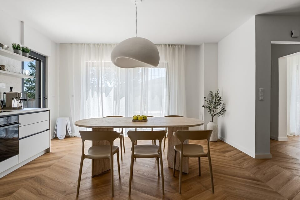 The villa is organized on the ground floor, offering 125 sqm of stylish interior space