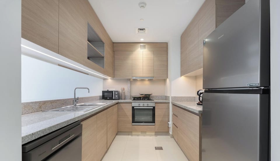 Family Apartment, 2 Bedrooms, Balcony, Park View | Private kitchen | Electric kettle, toaster, freezer, dining table