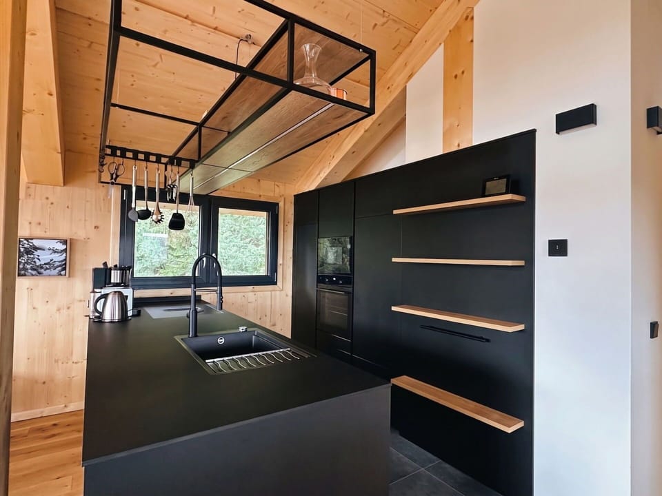 Wood, Interior Design, Flooring, Ceiling, Floor, Light Fixture, Kitchen, Countertop, Wood Stain, Hardwood
