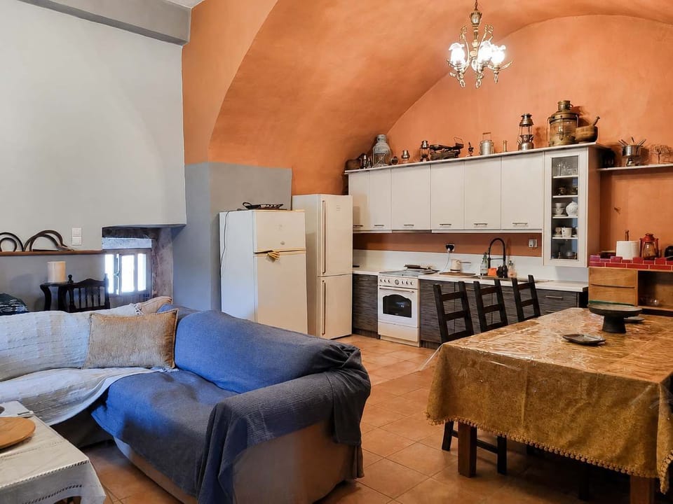 This open living and dining space feels warm and relaxed, with rustic touches, soft seating, and a homely atmosphere. Ideal for slow mornings, shared meals, or quiet evenings indoors