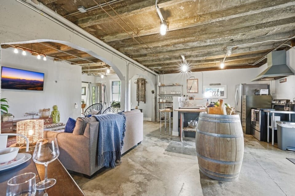 Open Concept Living Area | Industrial Design & Exposed Ceilings | Stainless Steel Kitchen