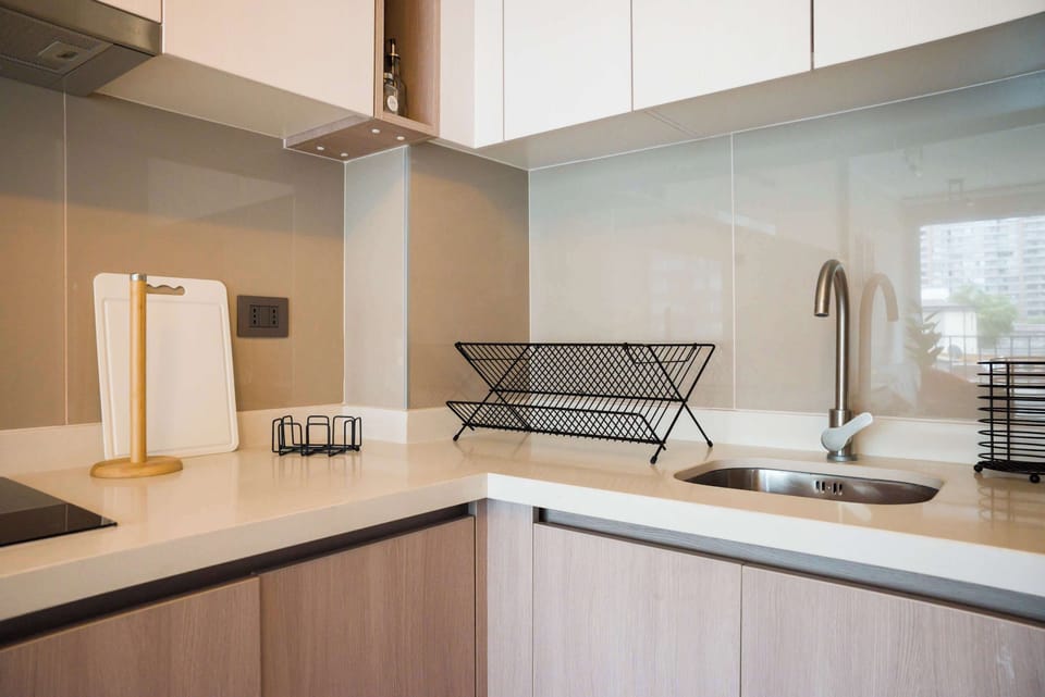 Modern kitchen with sleek design and ample counter space, perfect for cooking and dining.