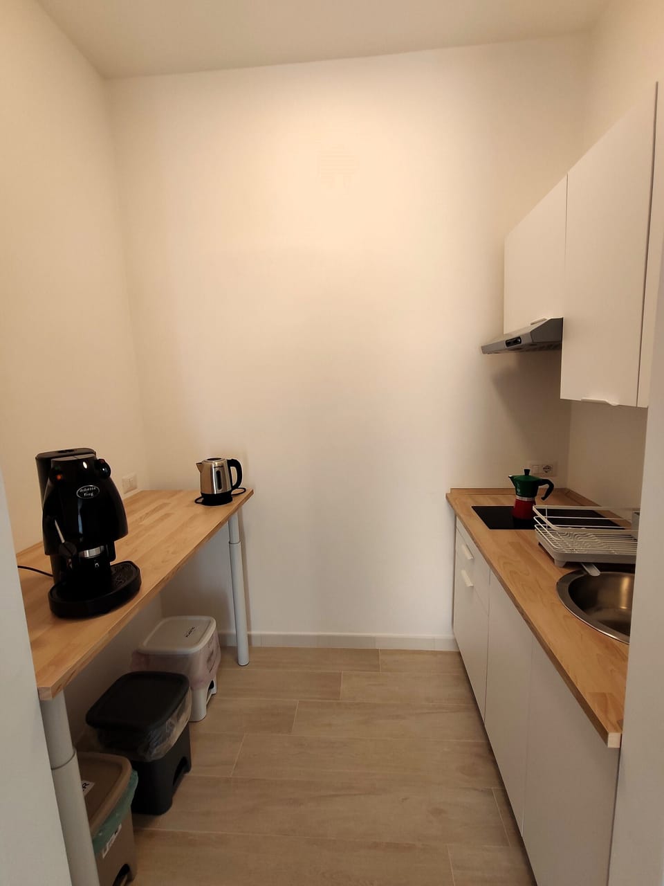 Espresso maker, coffee/tea maker, mini-fridge, microwave