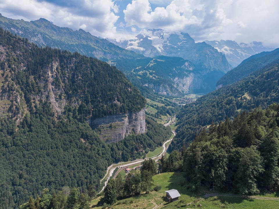 Breathtaking panoramic view over the Lauterbrunnen Valley and surrounding Alps.
