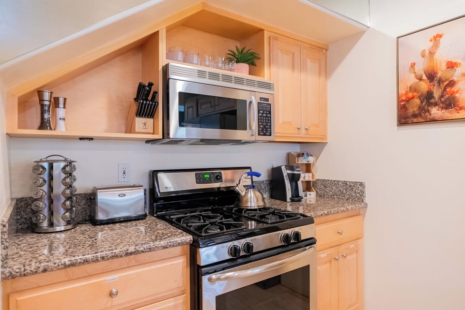 Your fully equipped kitchen at Gem features granite countertops