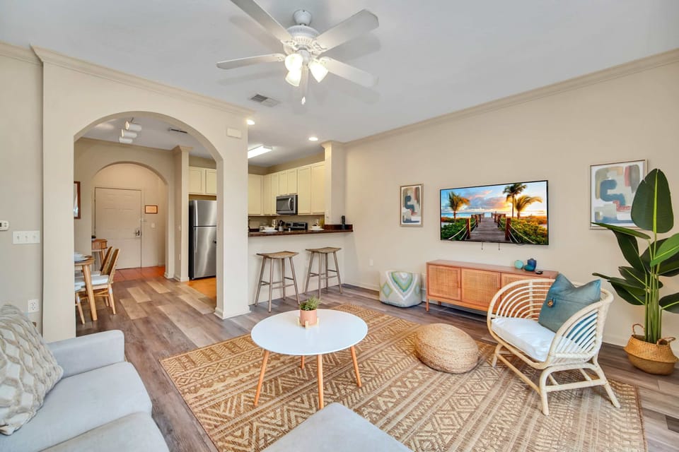 Modern living room with outdoor patio access and smart TV