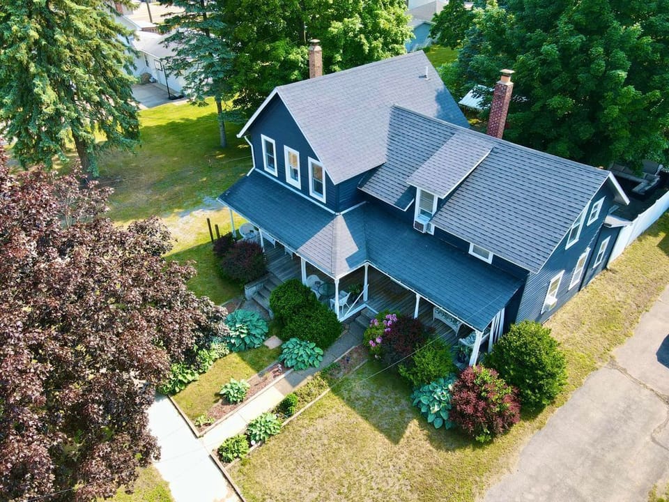 The Darling Duplex North has a shared covered front porch.