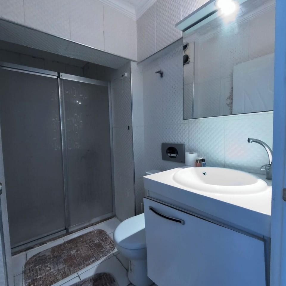 Family Quadruple Room, 2 Bedrooms, Smoking, Sea View | Bathroom | Shower, rainfall showerhead, free toiletries, hair dryer