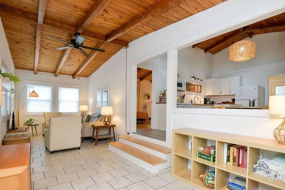 Vaulted wood ceilings, abundant natural light, and a cozy place to relax after a day in the sun.