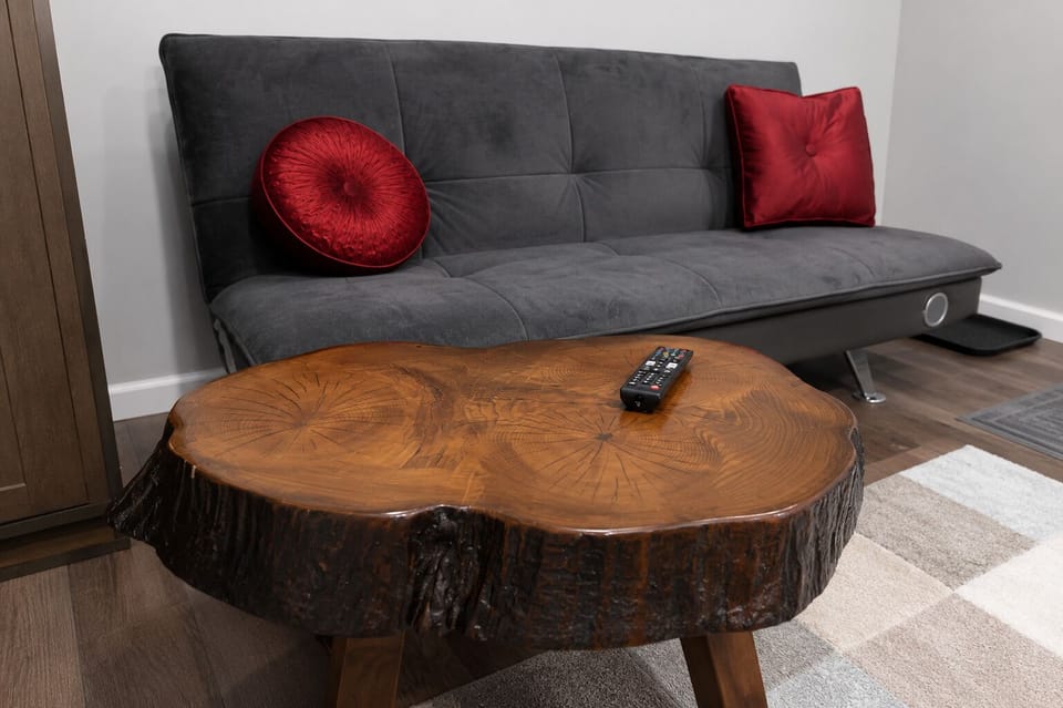 Relax with a 55” TV and comfy futon for lounging or extra guests.