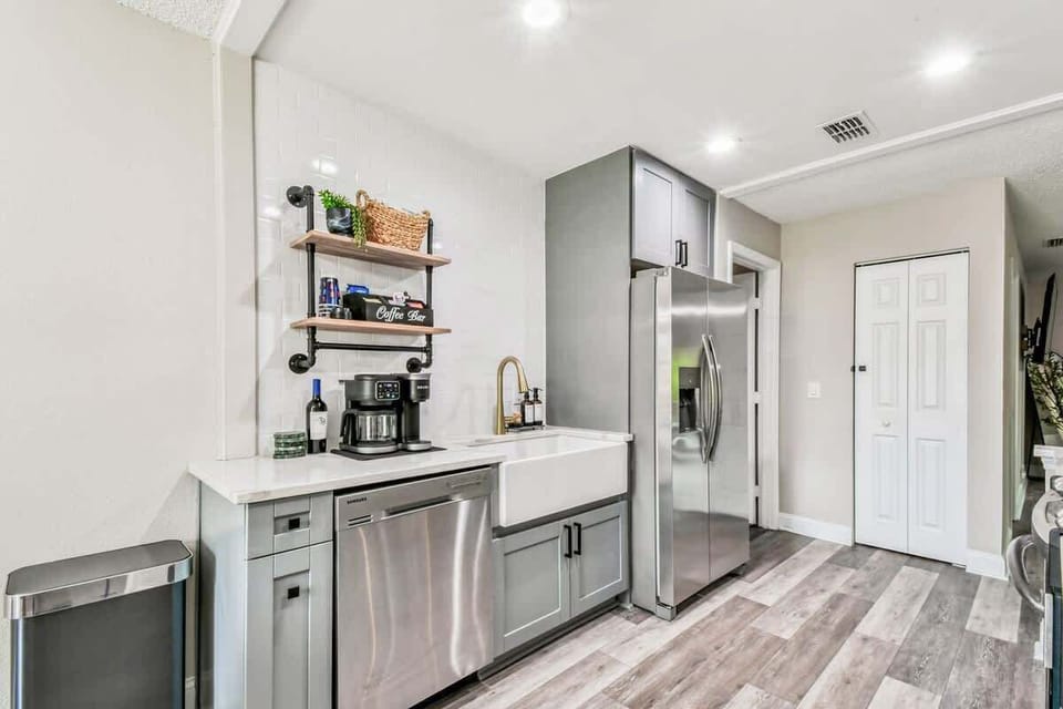 Modern kitchen space is a guest's dream, combining industrial charm with high-end convenience.