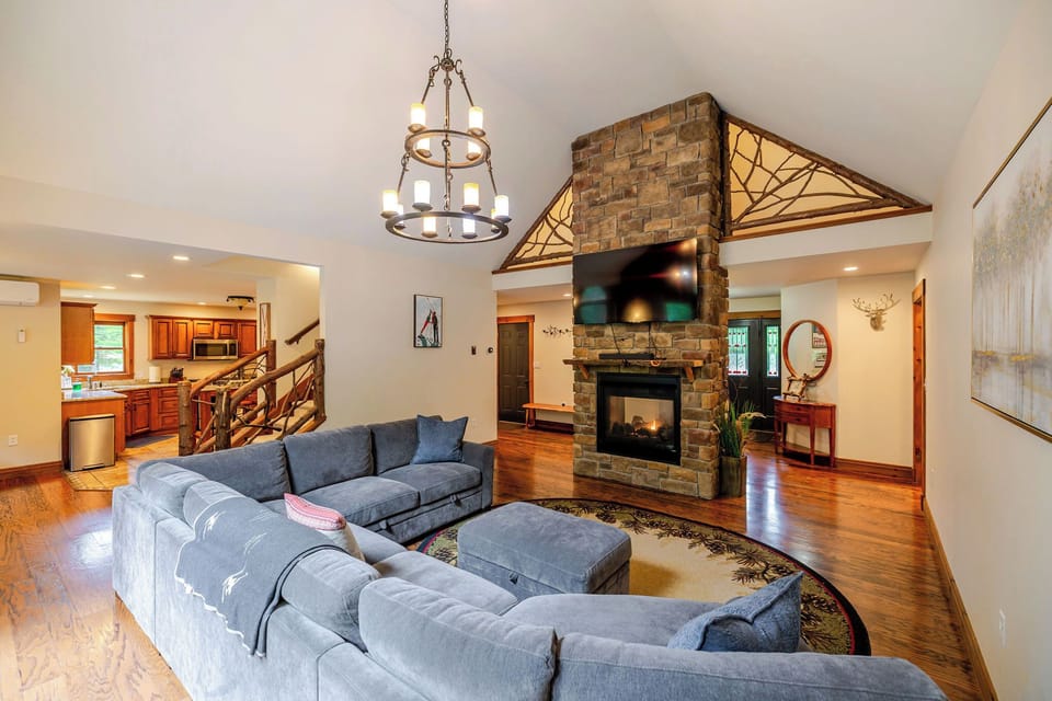 Relax by the double-sided gas fireplace while enjoying time together after a day outdoors.