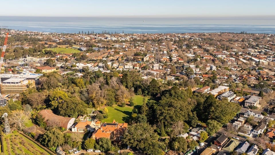A leafy neighbourhood surrounded by parks and close to the coastline