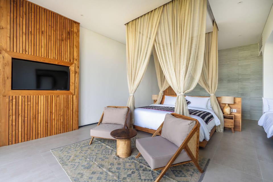Luxury Suite, Ocean View, Poolside | Premium bedding, memory foam beds, minibar, desk