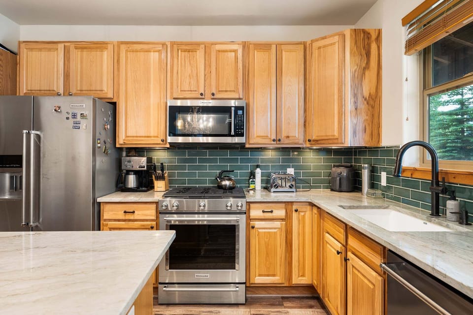 Fully equipped kitchen with stainless steel appliances