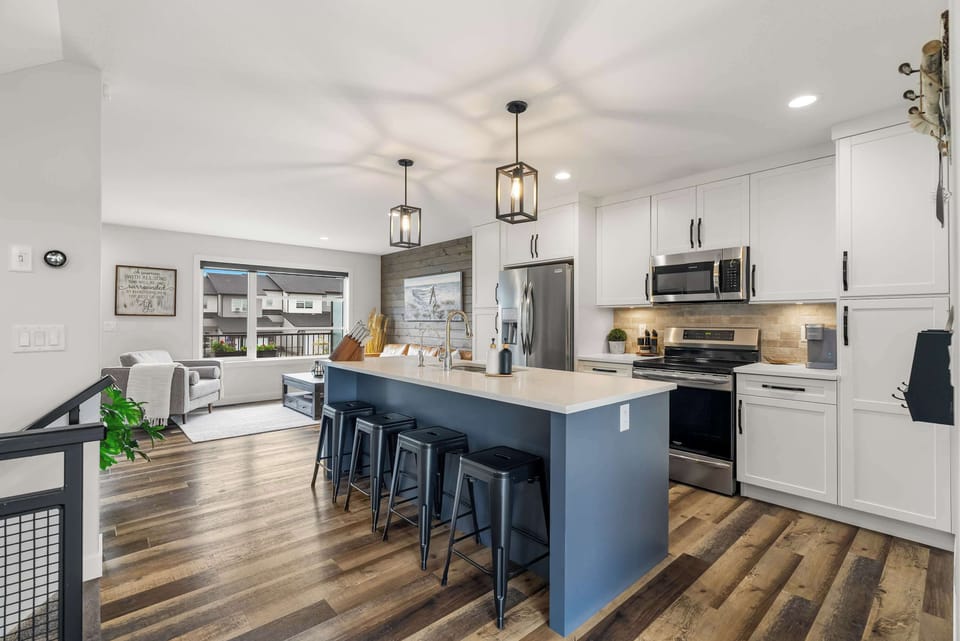 Bright upscale kitchen with a large island and bar seating