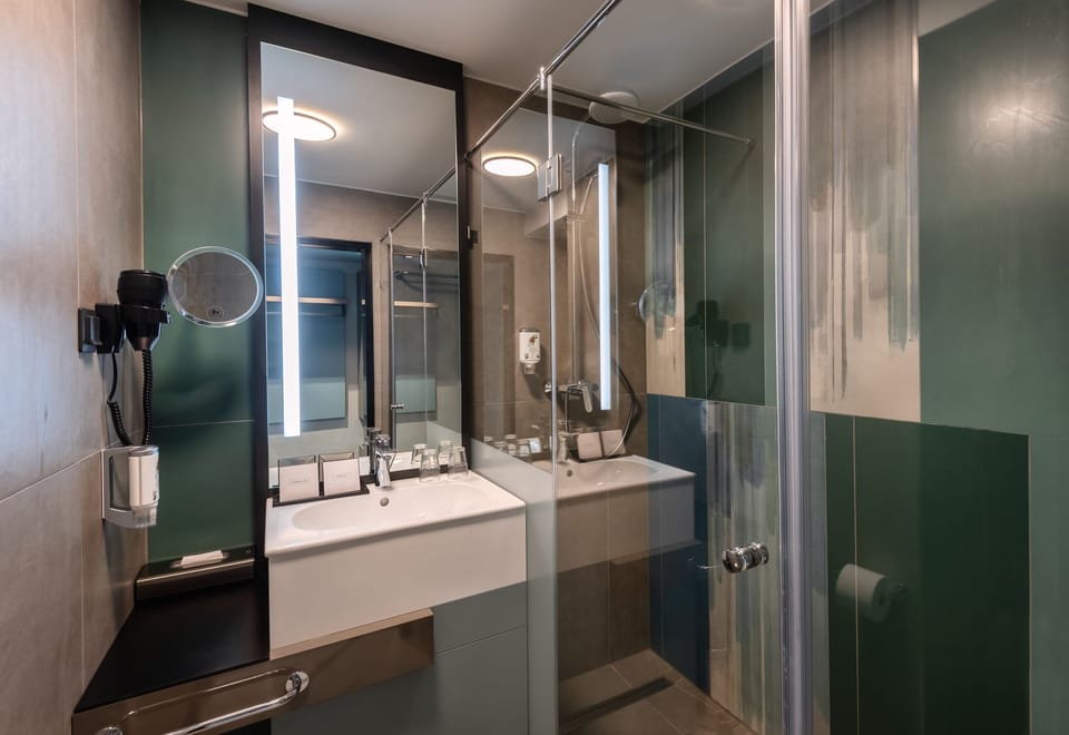 Shower, hair dryer, bathrobes, towels