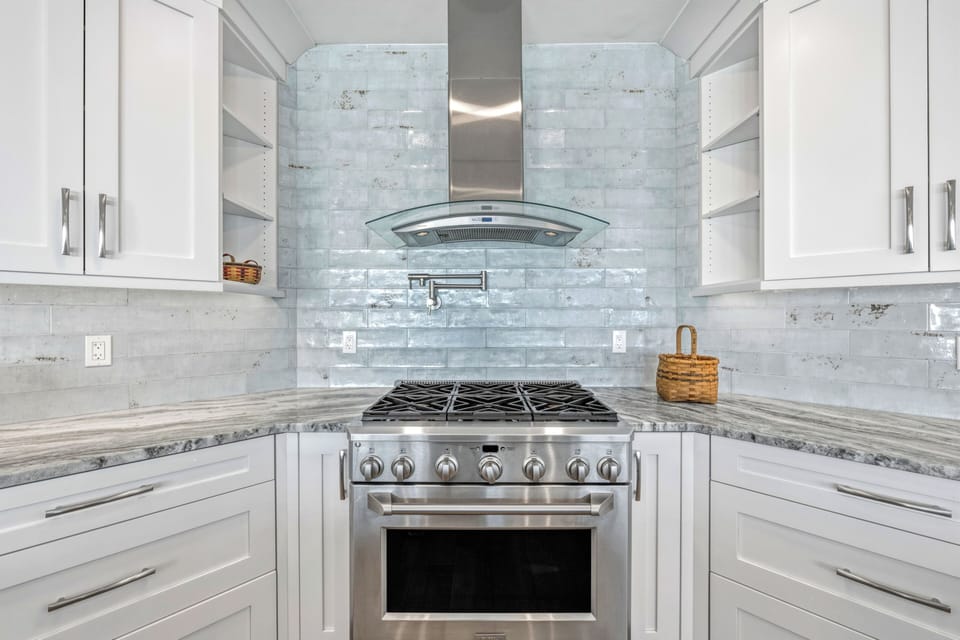 Prepare your favorite meals on the professional gas range with convenient pot filler.
