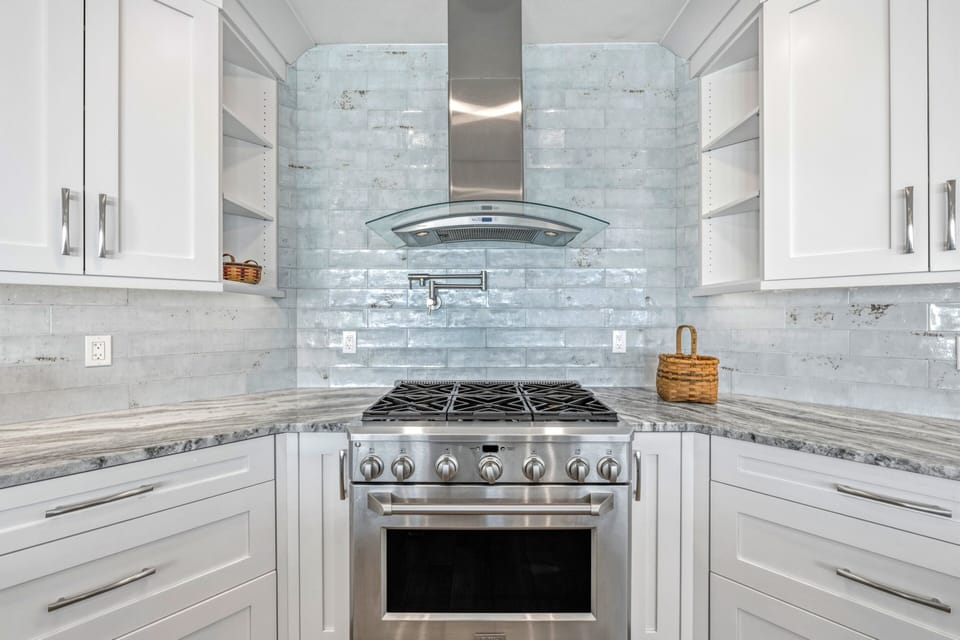Prepare your favorite meals on the professional gas range with convenient pot filler.