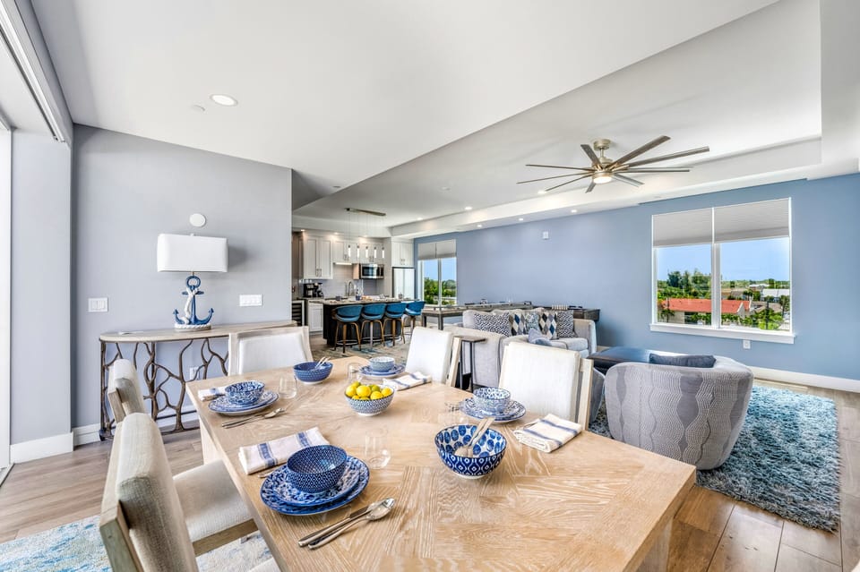 The dining area offers comfortable seating for shared meals in the heart of the home.