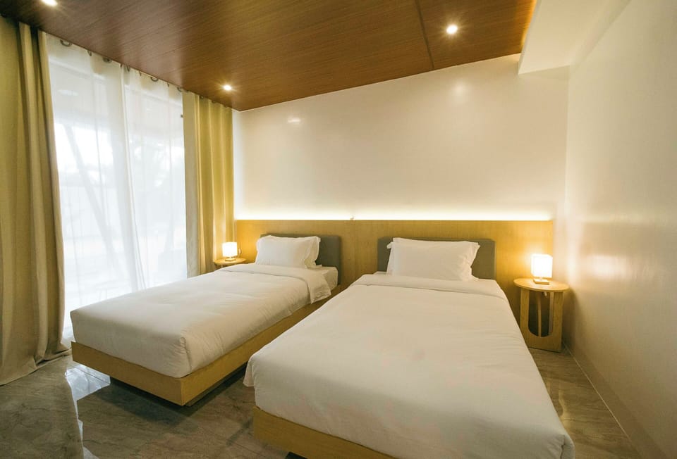 Deluxe Double or Twin Room, Patio, Resort View | Down comforters, minibar, bed sheets