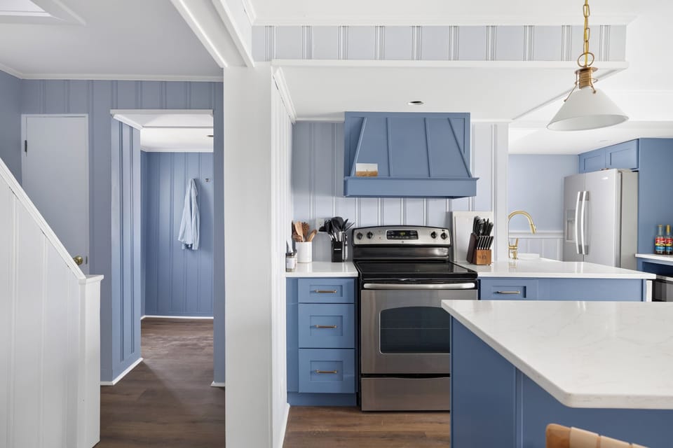 Electric stove, full oven, every counter you’d need — cook a real dinner for ten people without improvising on space or equipment.