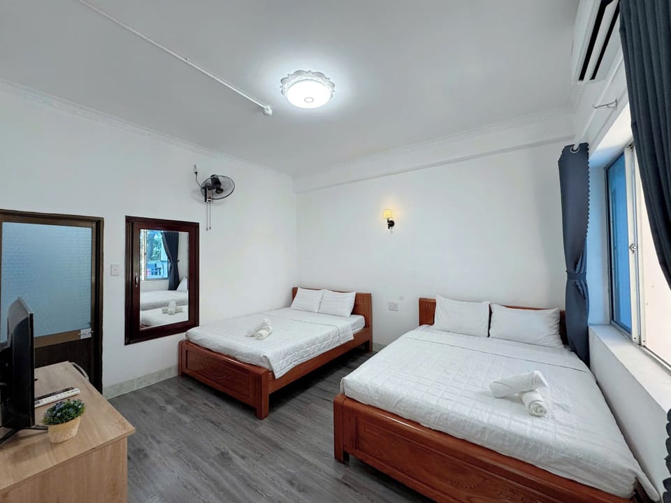 Superior Quadruple Room, City View | Desk, WiFi (free), individually decorated, bed sheets