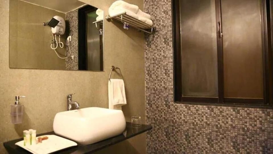 Shower, free toiletries, towels, soap
