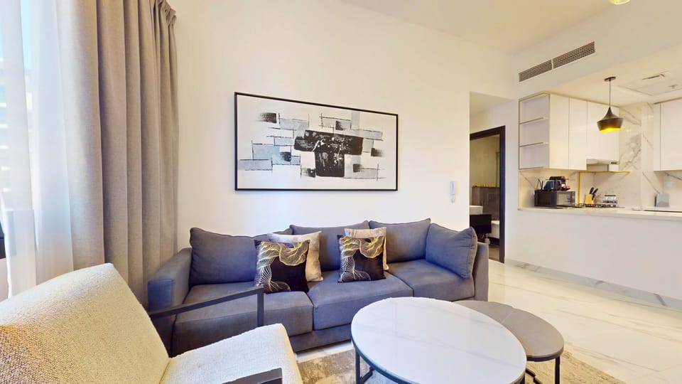 Deluxe Apartment, Balcony, City View | Living area | 55-inch Smart TV with digital channels