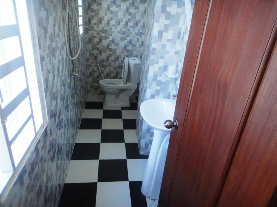 Shower, free toiletries, slippers, towels