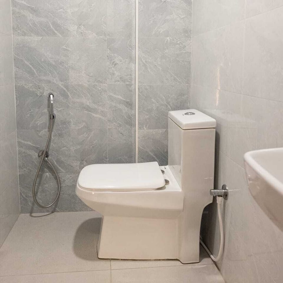 Shower, slippers, towels, soap